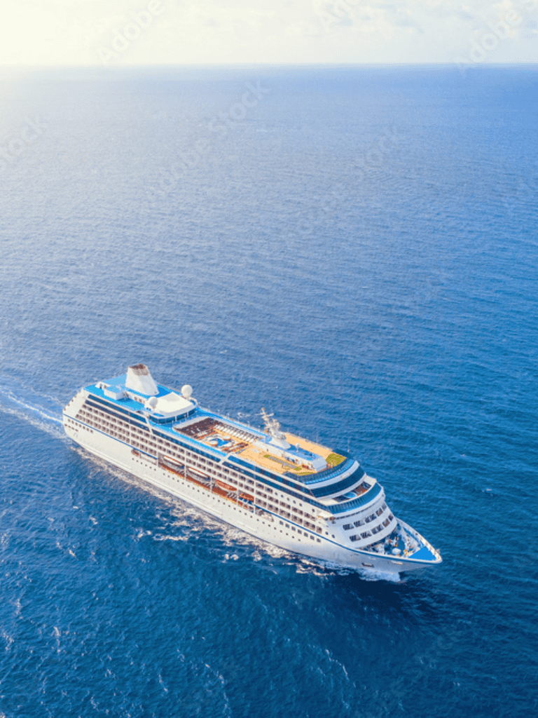 Luxury cruise ship sailing on deep blue ocean, vacation destination, travel, ocean adventure, cruise voyage.
