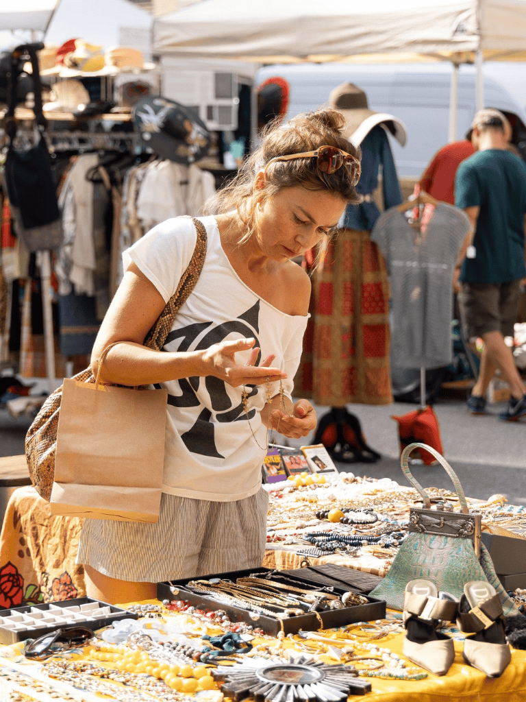 Vintage marketplace shopping for unique jewelry at QuestForDirections flea market.