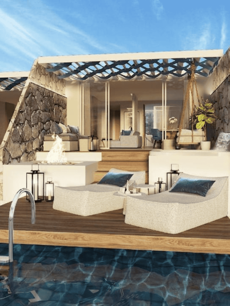 Relaxing outdoor poolside lounge with modern furniture and stunning architectural design.
