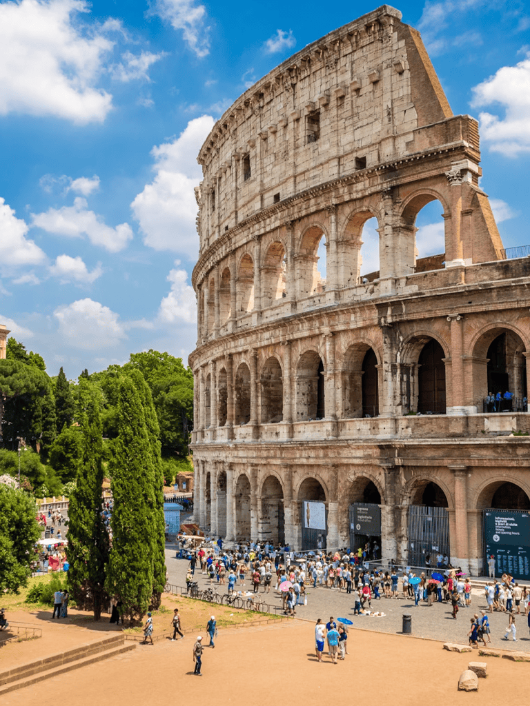 Ancient Roman Colosseum in Rome with tourists visiting, historic landmark and tourist attraction.