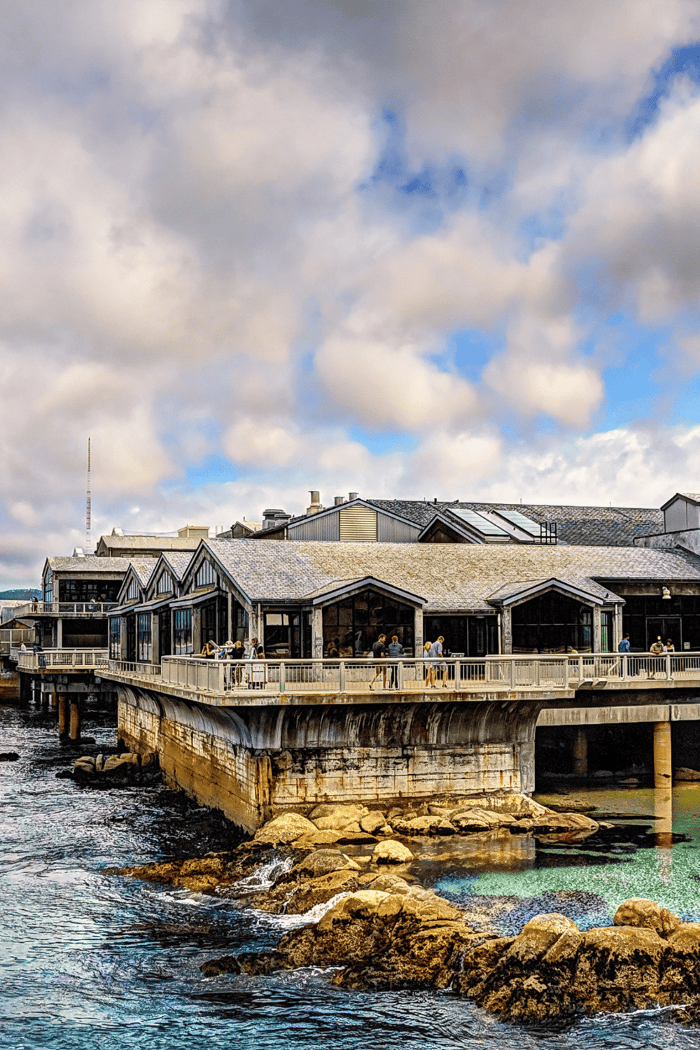 Seaside restaurant with ocean view, outdoor dining, and scenic waterfront location.