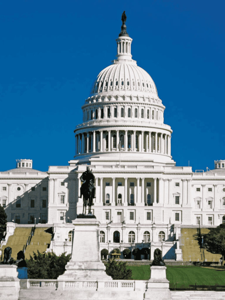 Iconic U.S. Capitol Building with clear blue sky in Washington, D.C.