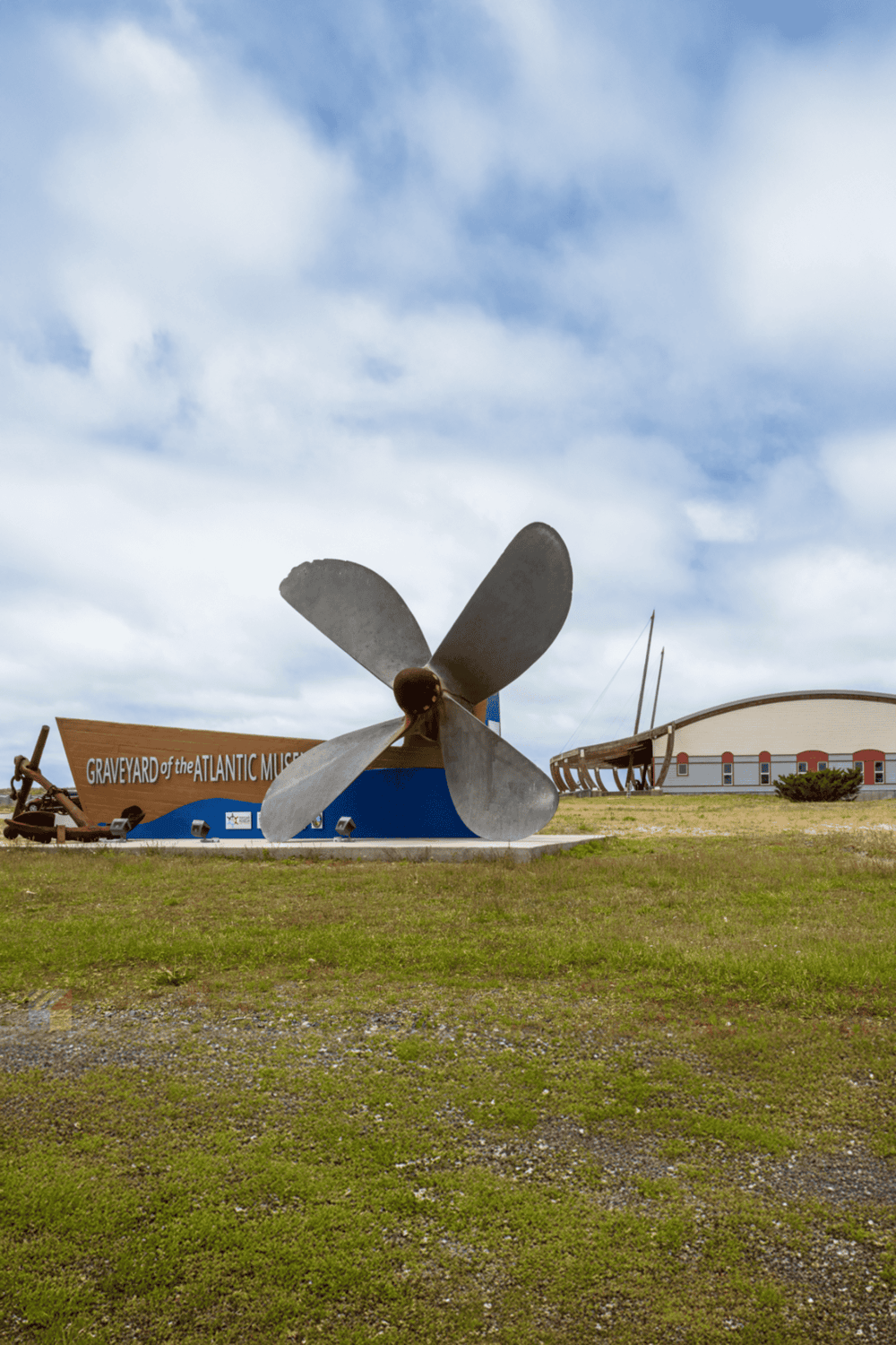 1. Large boat propeller and maritime museum exhibit at Atlantic Music Festival, scenic outdoor view.
