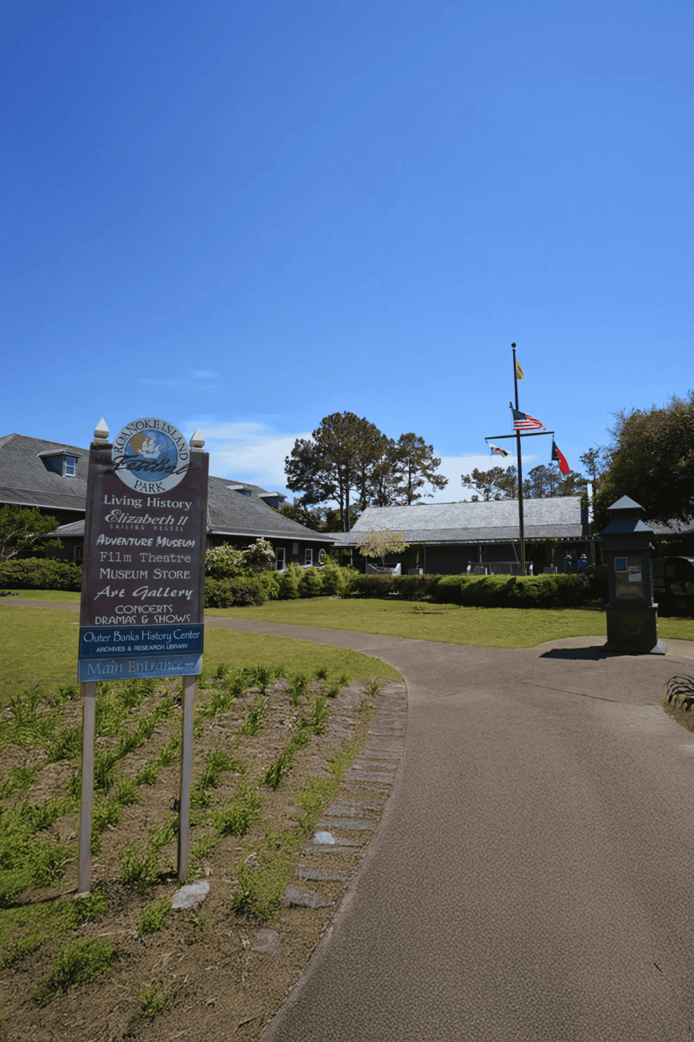 Historic Roanoke Island Park entrance with museum and scenic surroundings.