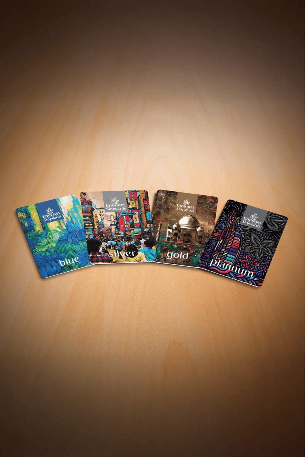 1. Colorful Emirates Skywards membership cards in blue, silver, gold, and platinum levels.