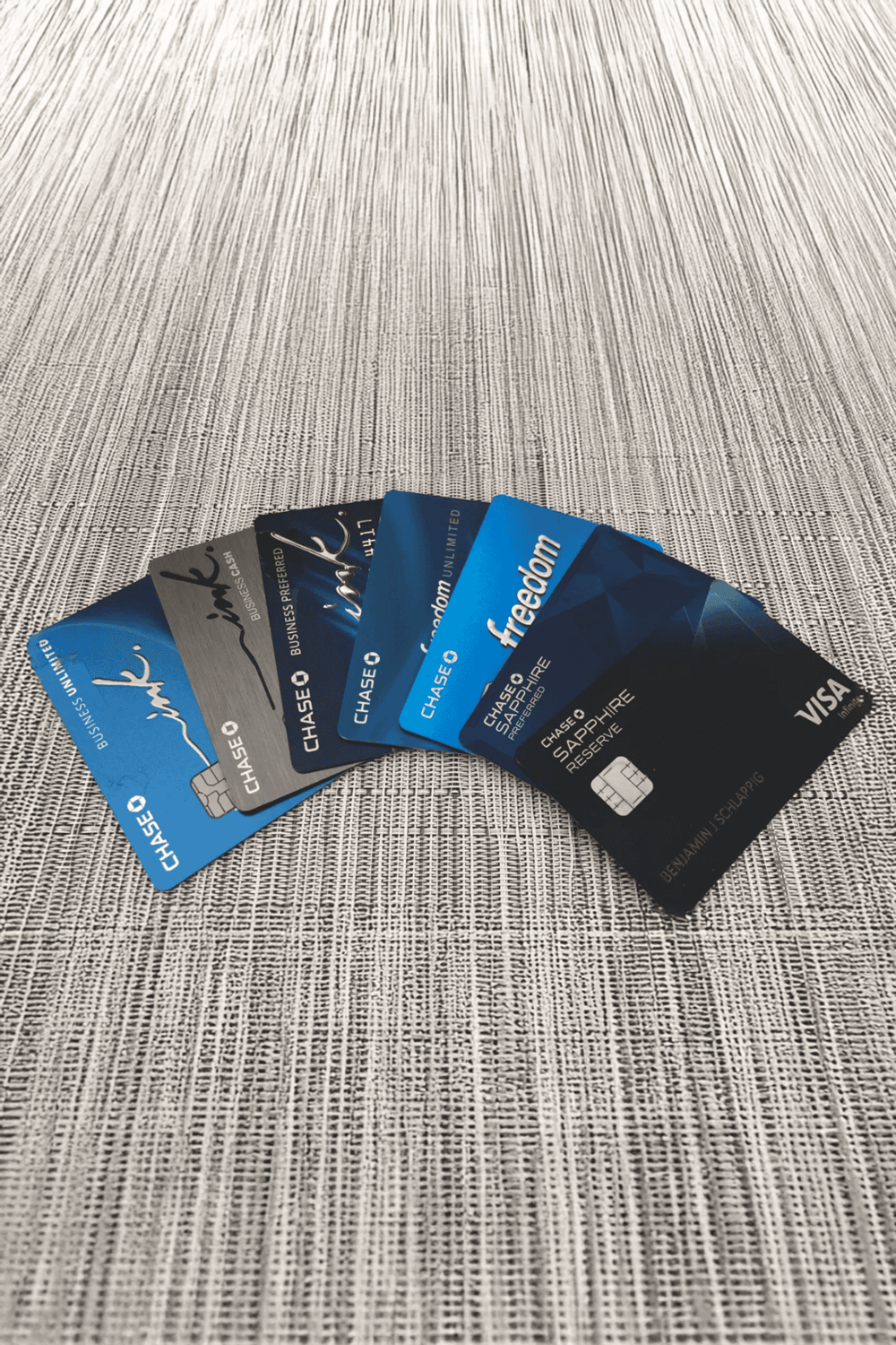Chase business credit cards, including Chase Sapphire Reserve, Freedom, and Ink, displayed on a textured surface for travel and financial services SEO.