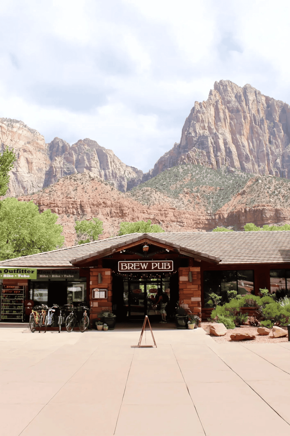 Brew Pub at Zion National Park with mountain views, outdoor seating, and bike rentals for visitors.
