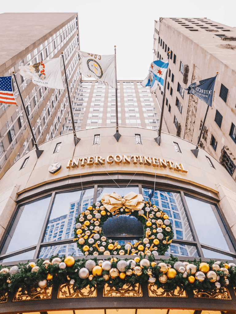 1. Flags outside InterContinental hotel with Christmas holiday decorations.