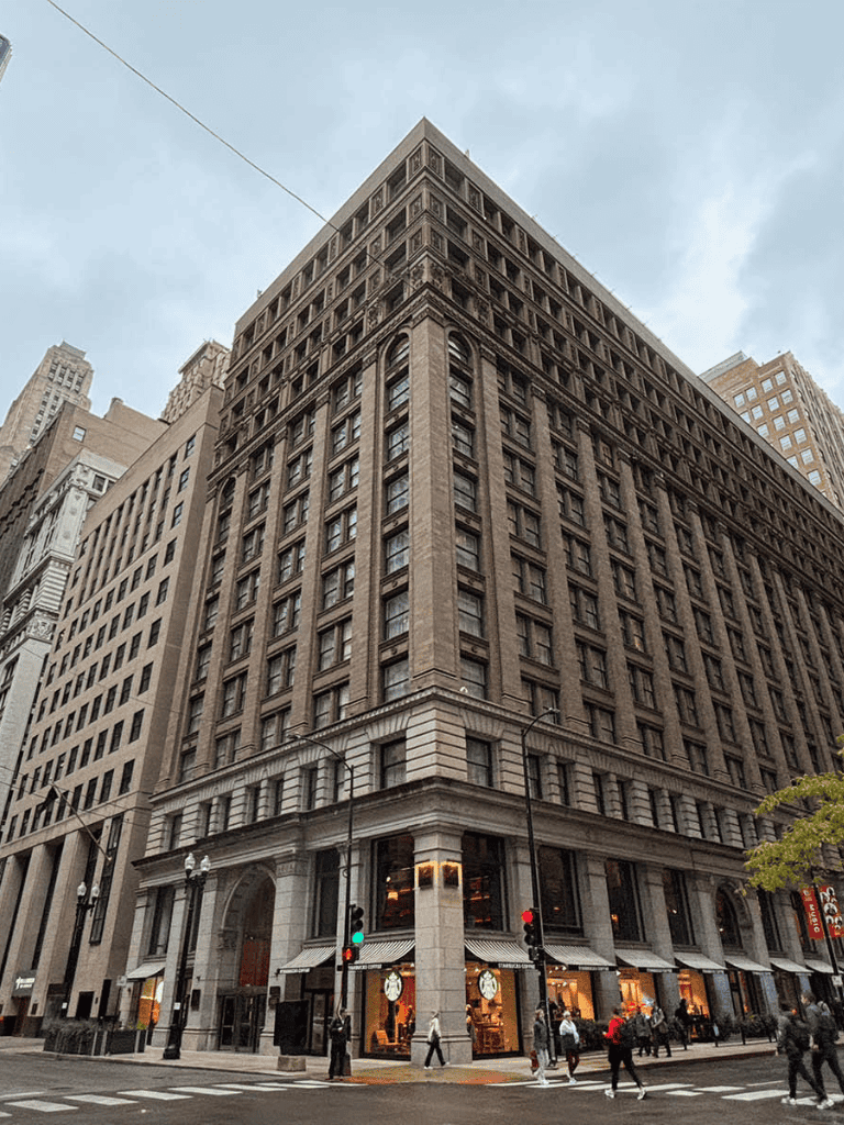 Modern downtown office building with retail shops on the ground floor.
