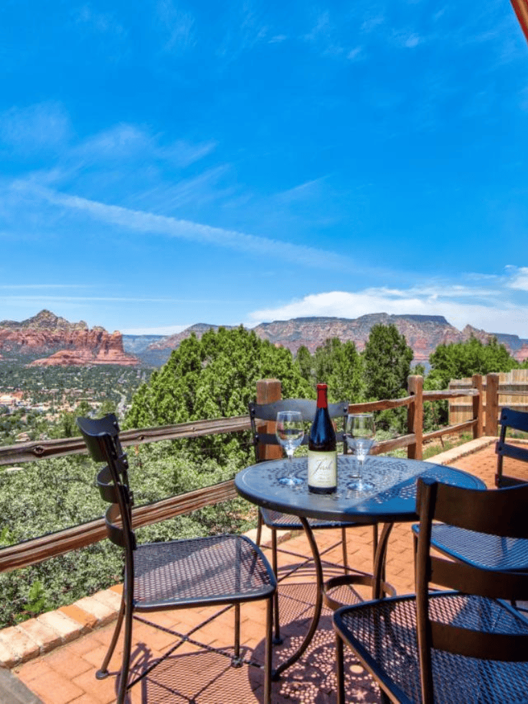 Breathtaking outdoor dining overlooking Sedona's scenic landscape with red rock formations.