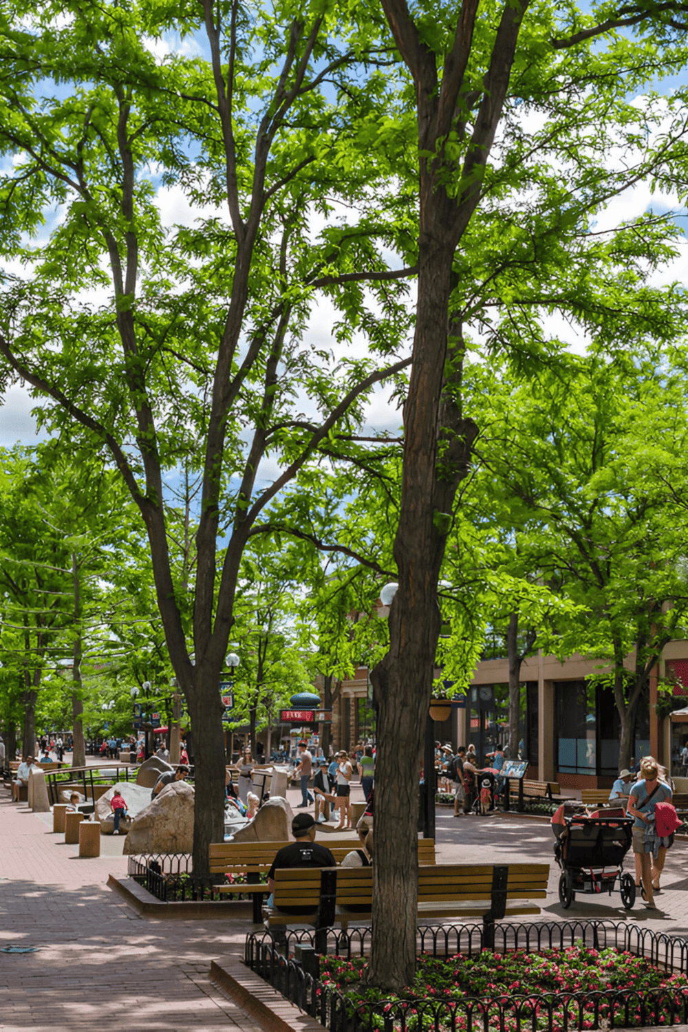 Lush green trees and bustling downtown scene in a vibrant city park area.