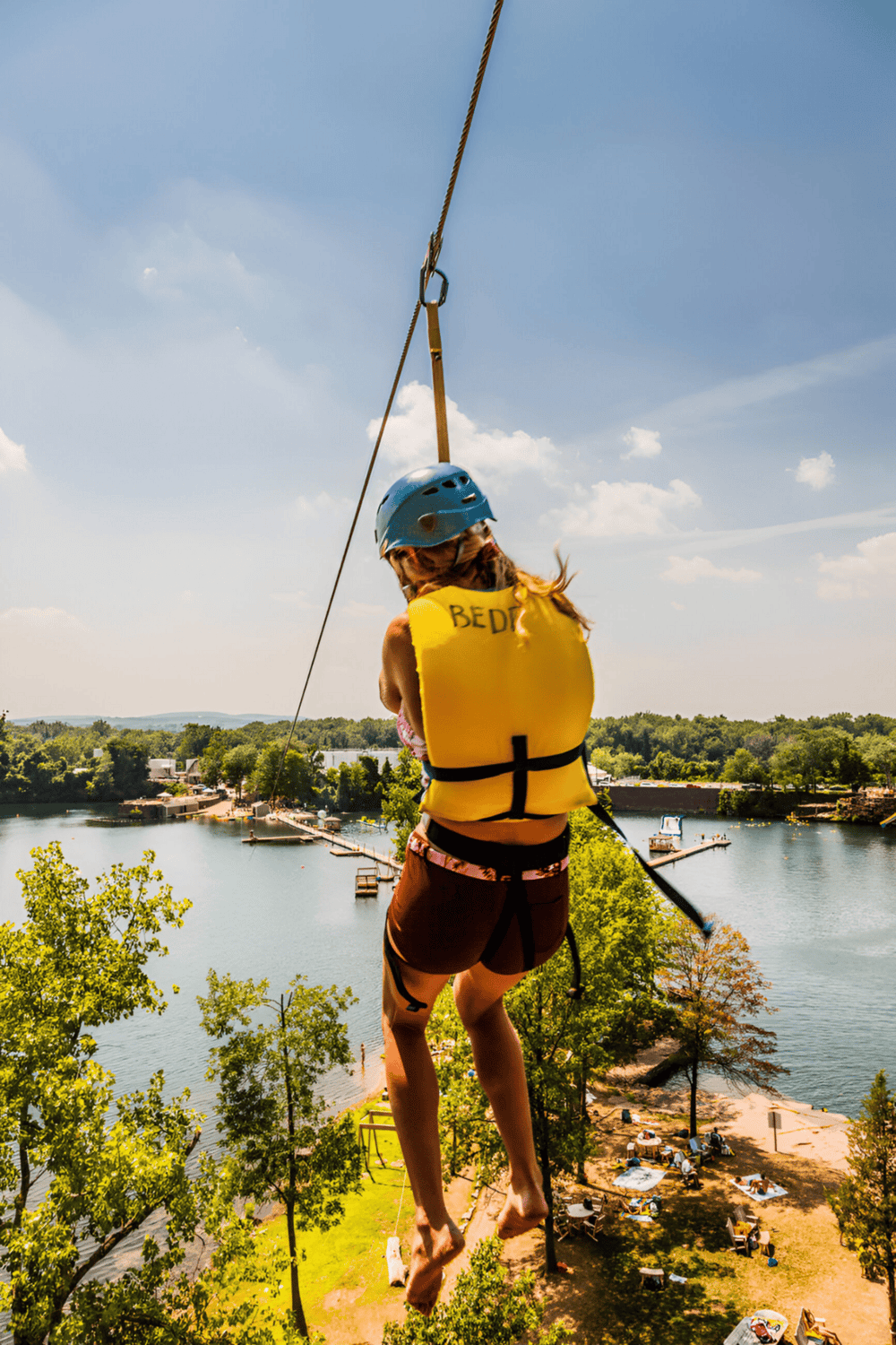 High ropes course adventure at QuestForDirections outdoor activity park.