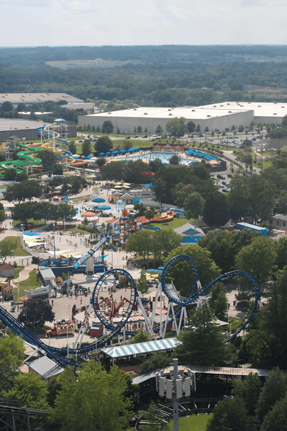 Amusement park with roller coasters, water slides, and fun attractions at Quest for Directions.