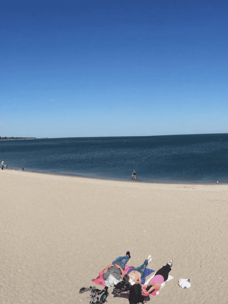 Seaside beach with relaxing ocean view for outdoor activities and family vacations.