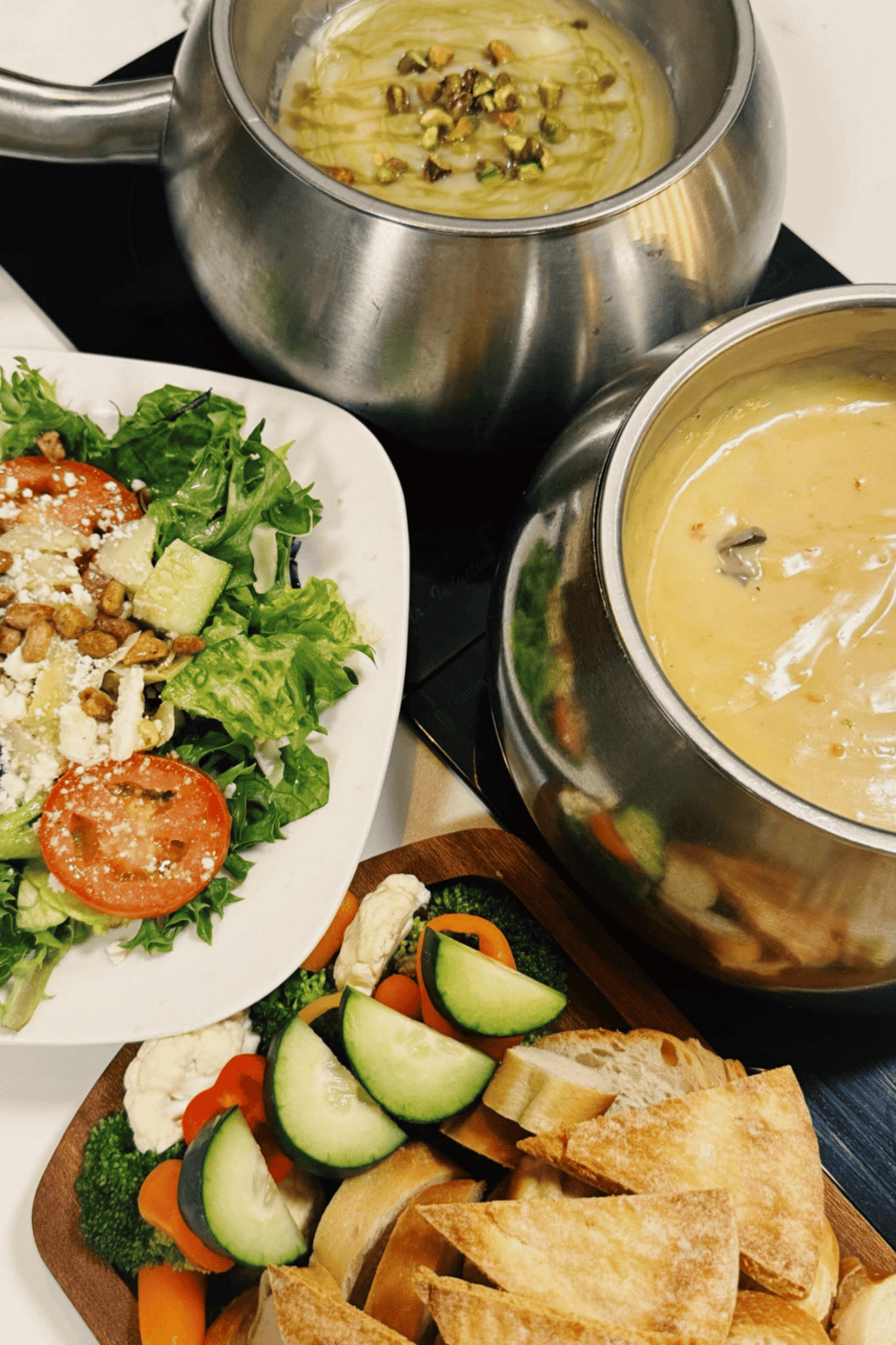 Stew with vegetables and salad, home-cooked comfort food, hearty meal, healthy dish, nutritious ingredients, delicious cuisine, homemade recipe, warm meal, savory stew, fresh vegetables.