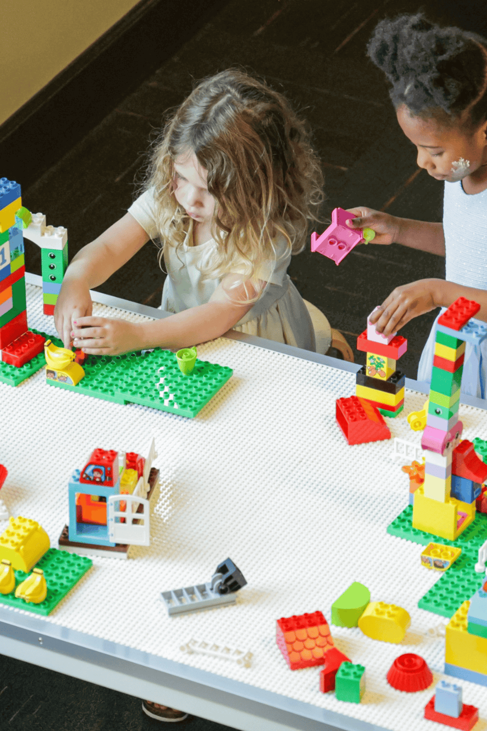 Colorful LEGO building activity for children, creative play and imagination development.