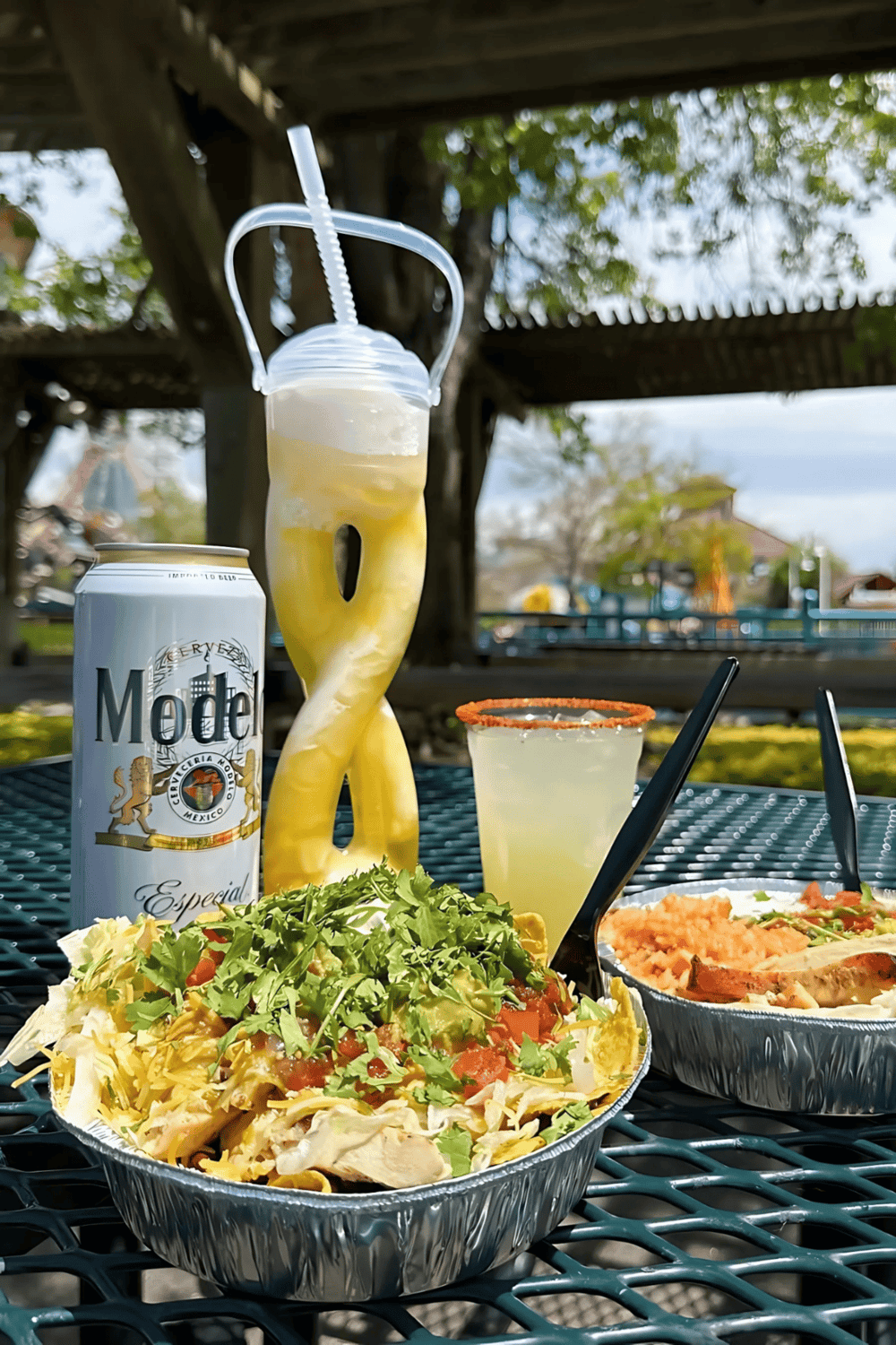 Fresh Mexican street food meal with salad, drinks, and outdoor setting, Explore flavorful Mexican dishes at QuestForDirections.