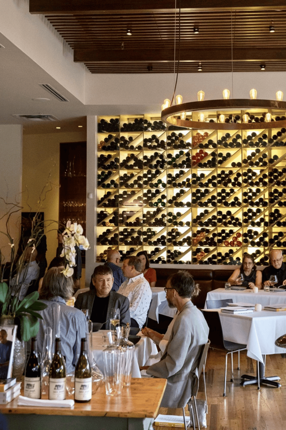 Elegant wine bar with diverse wine selection and stylish interior decor.