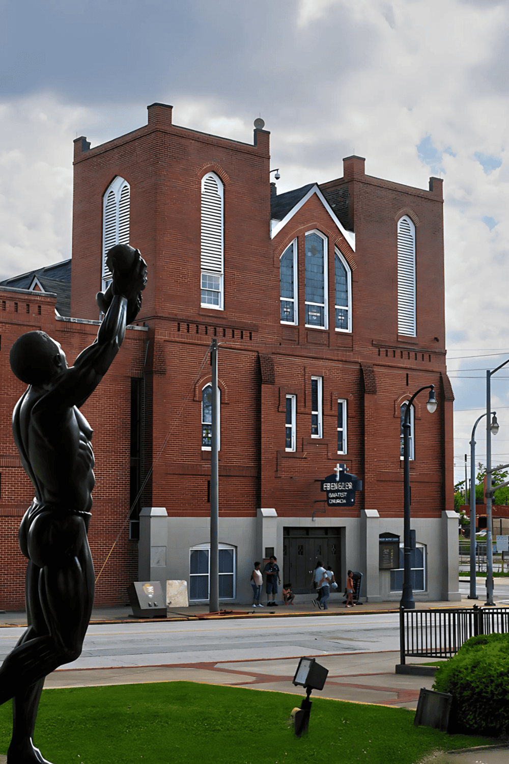 Statue of a baseball player in front of the historic Eastgate Baptist Church in Chattanooga Tennessee.