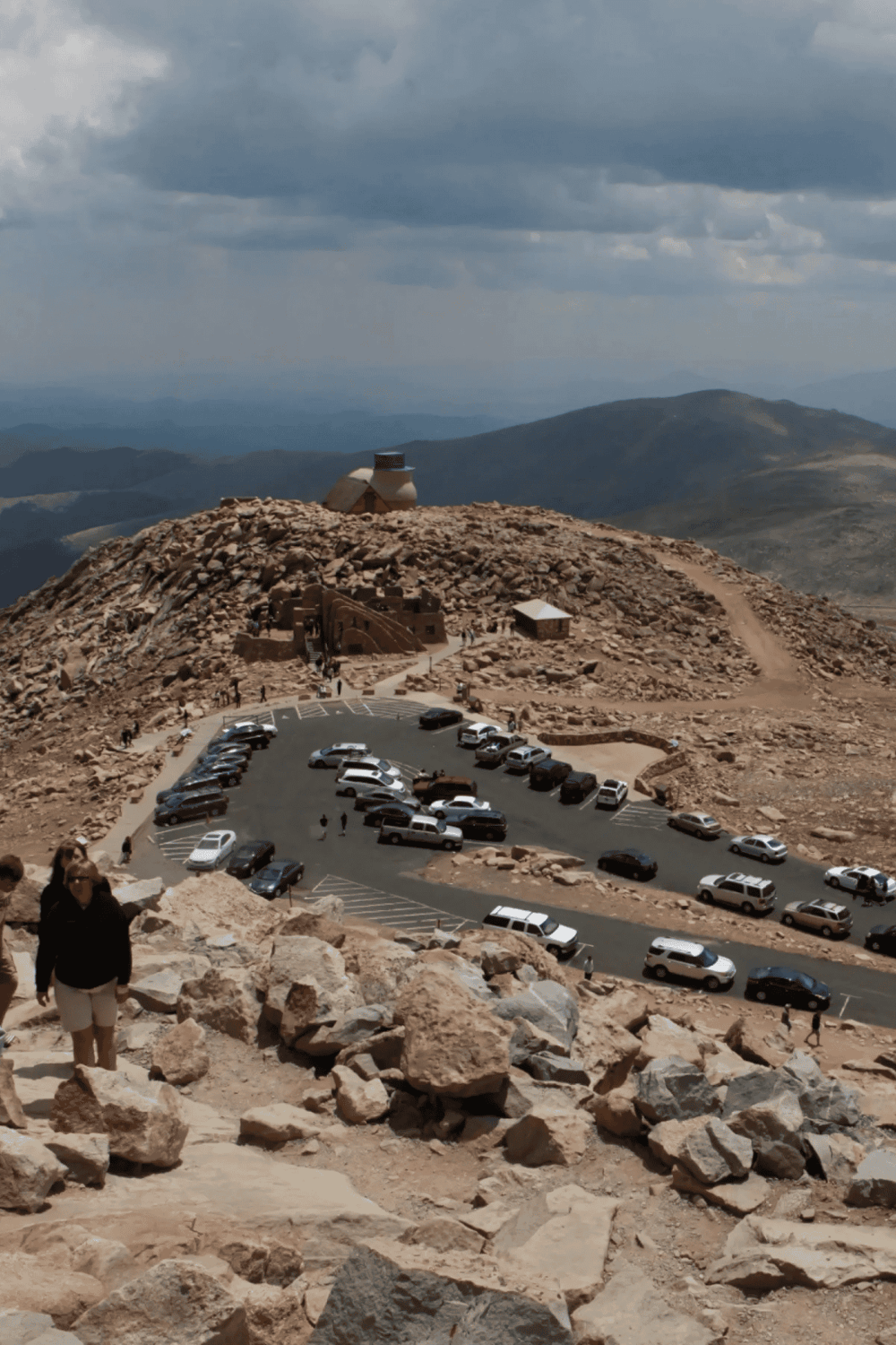 Climbing Mount Evans in Colorado, offering scenic mountain views and a popular tourist destination.