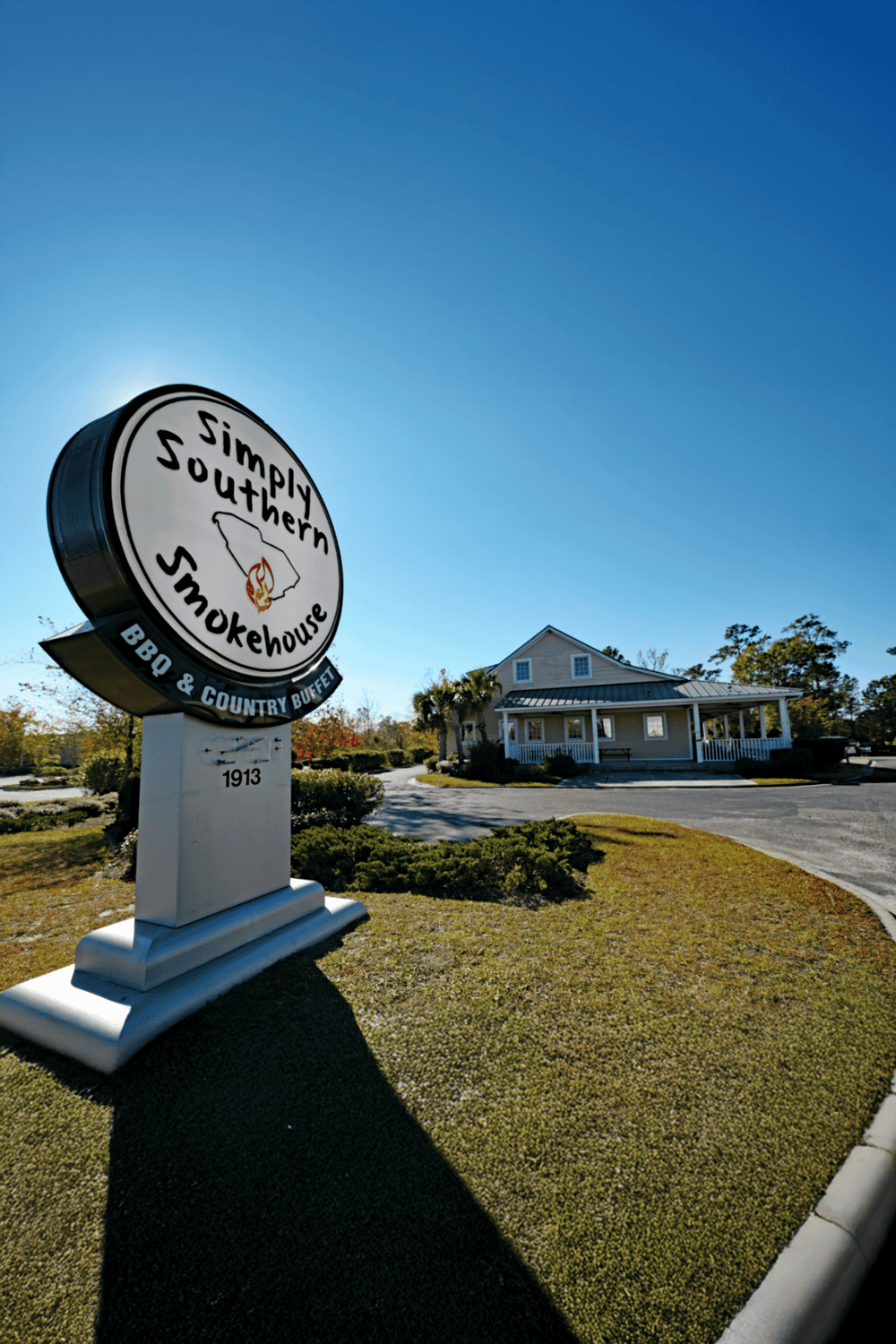 BBQ restaurant sign in South Carolina, offering southern cuisine, with a country buffet and casual dining experience.