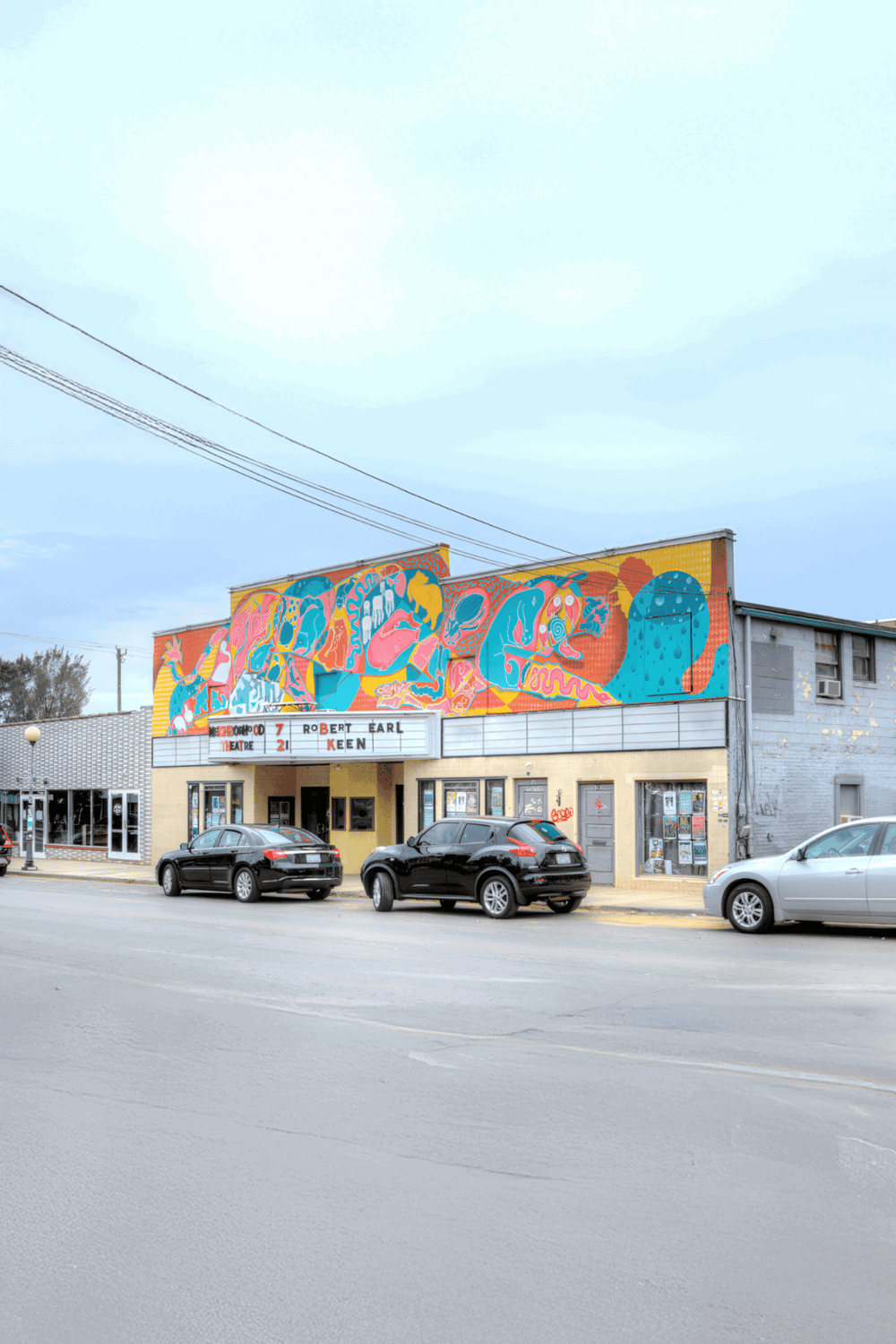 Colorful mural on theater building in QuestForDirections neighborhood.