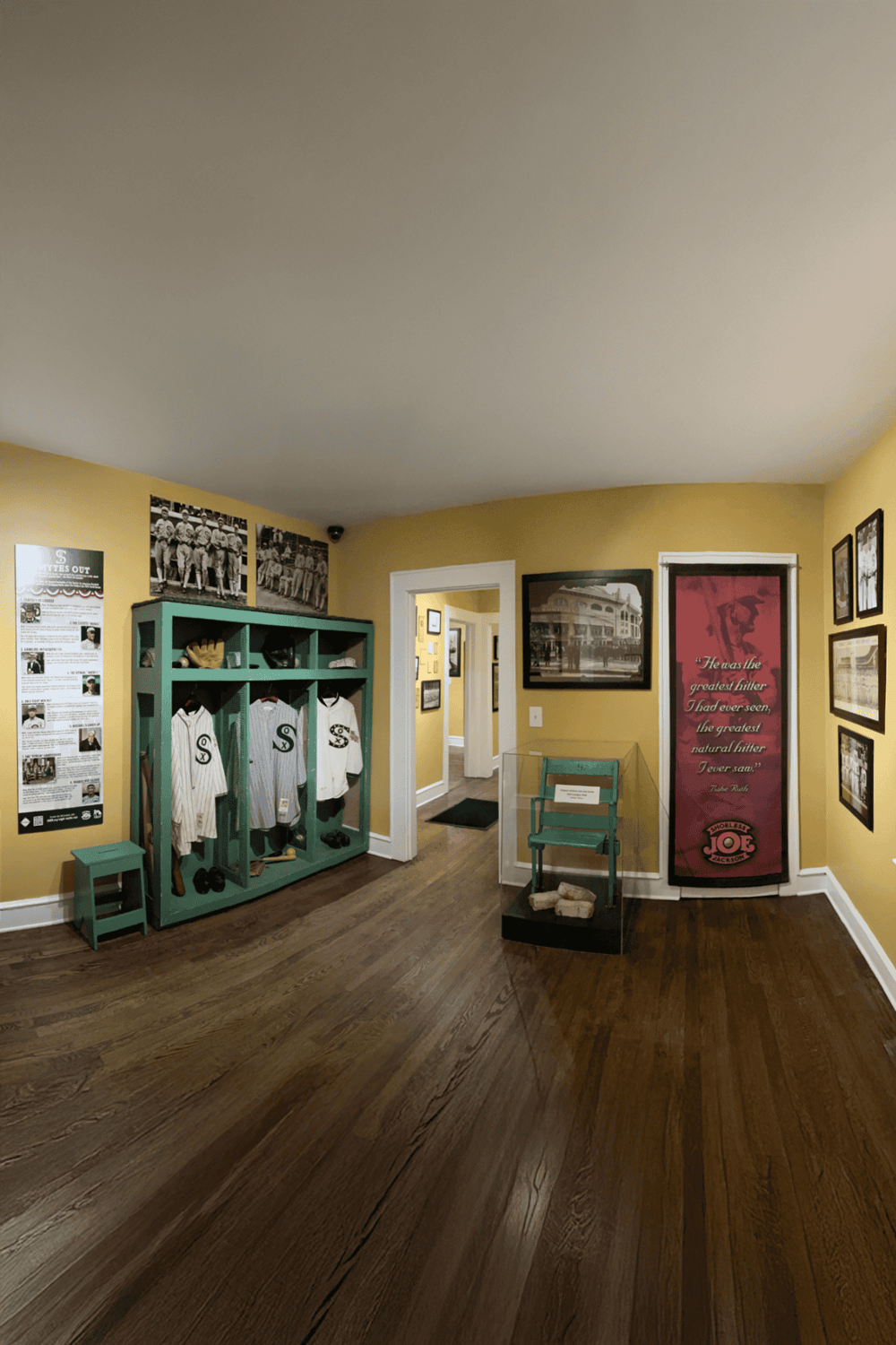 Vintage baseball memorabilia display at Quest for Directions museum, highlighting historic sports achievements.