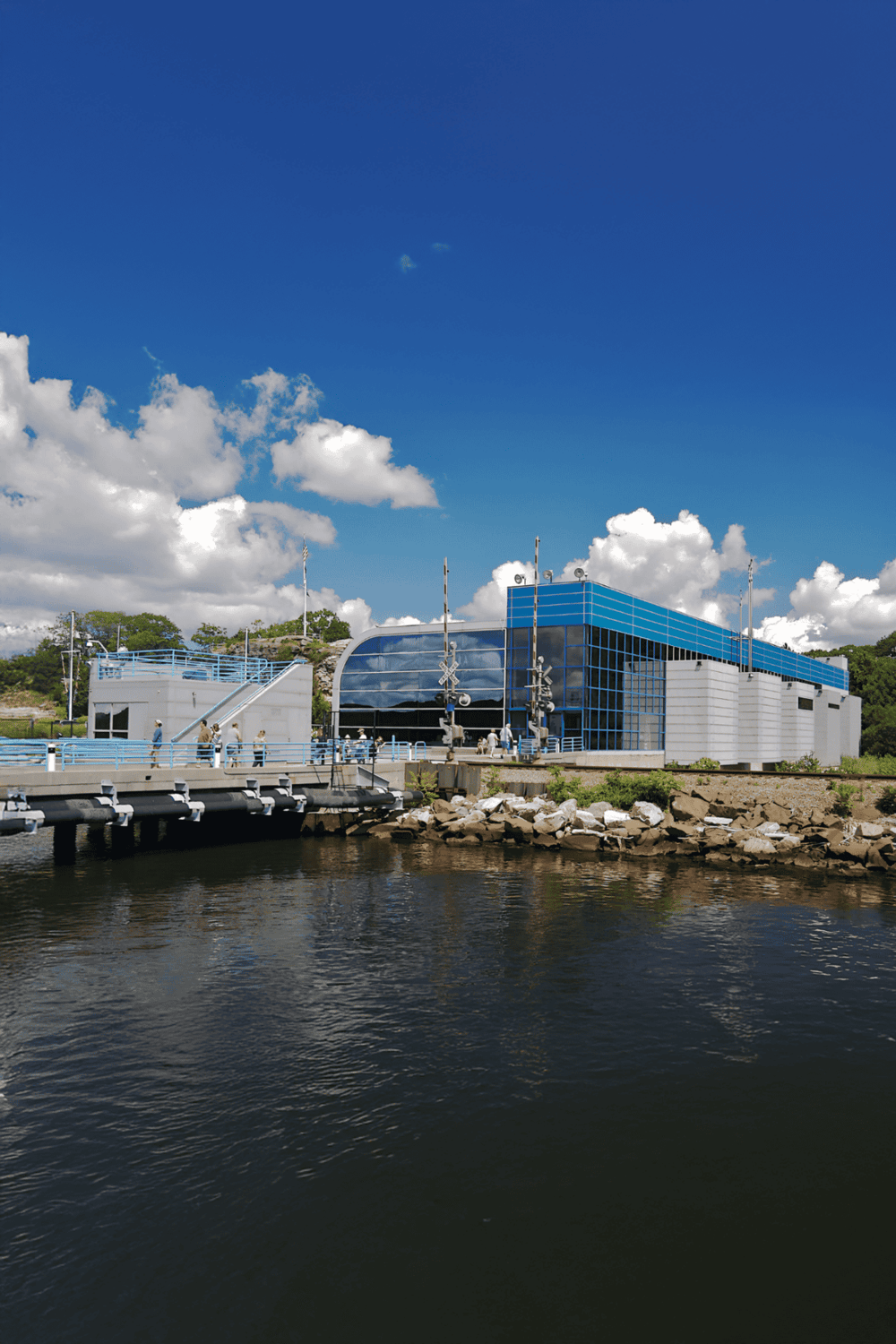1. Modern Blue Waterfront Building at QuestForDirections.