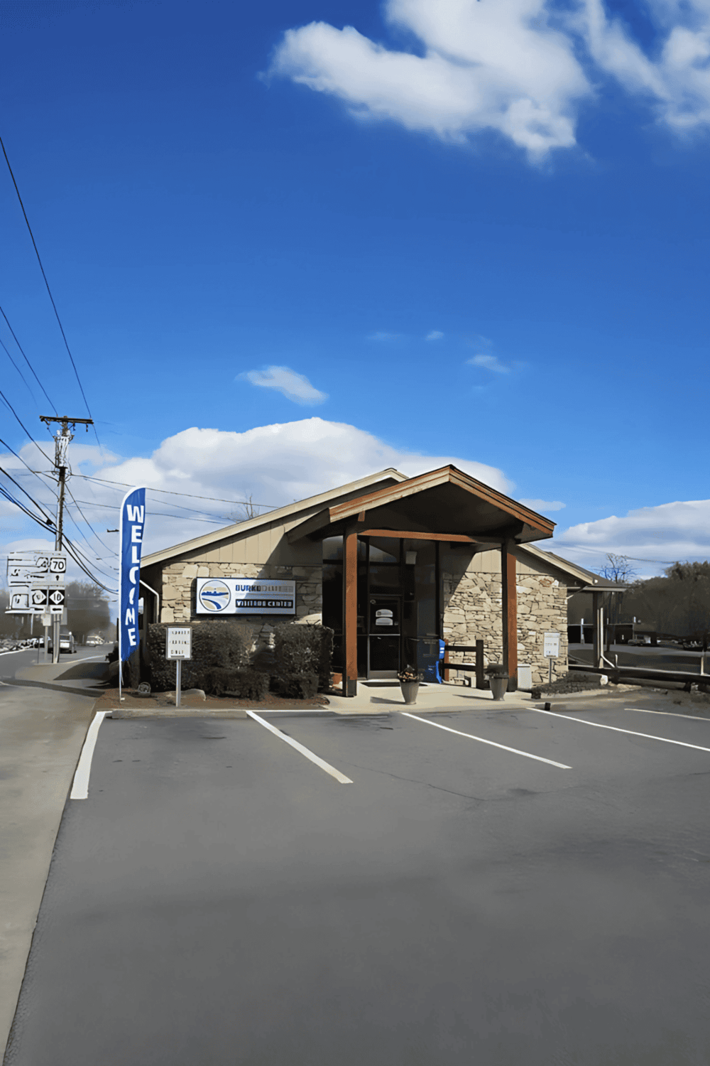 1. Modern visitor center with stone facade and welcoming entrance in a scenic location.