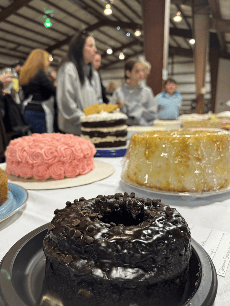 Delicious assorted cakes and desserts at a celebration event.