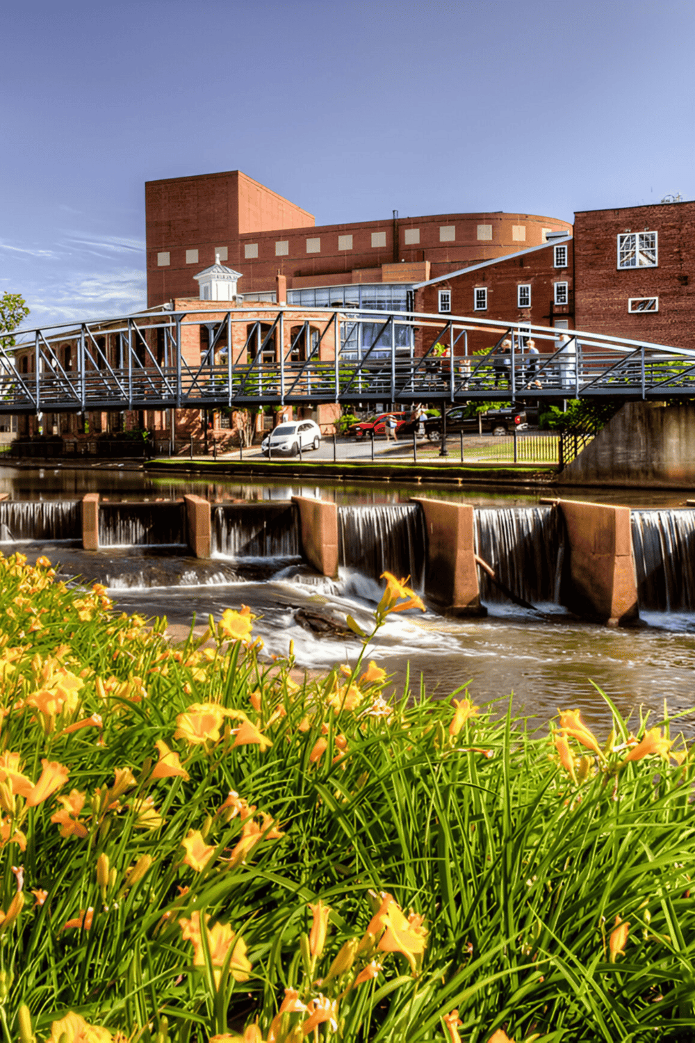Historic Theater Riverwalk in Fall River, Massachusetts, showcasing downtown architecture and scenic water views.