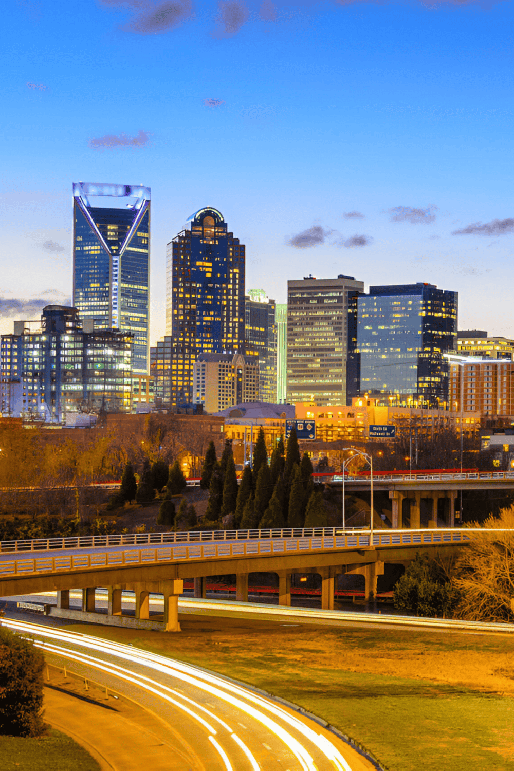 Modern city skyline with skyscrapers and night lights, downtown Dallas, Texas.