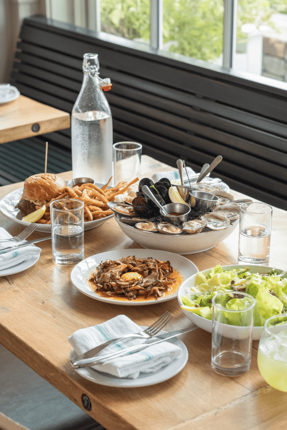 Fresh seafood and classic dishes served at a cozy restaurant with natural light.