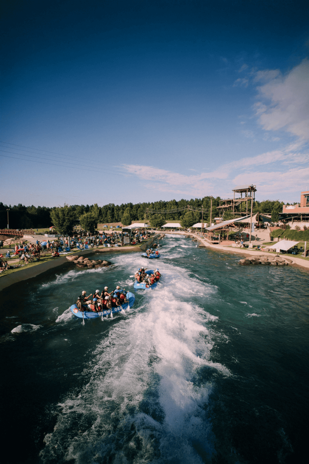Thrilling white water rafting adventure at Quest for Directions outdoor activity park.