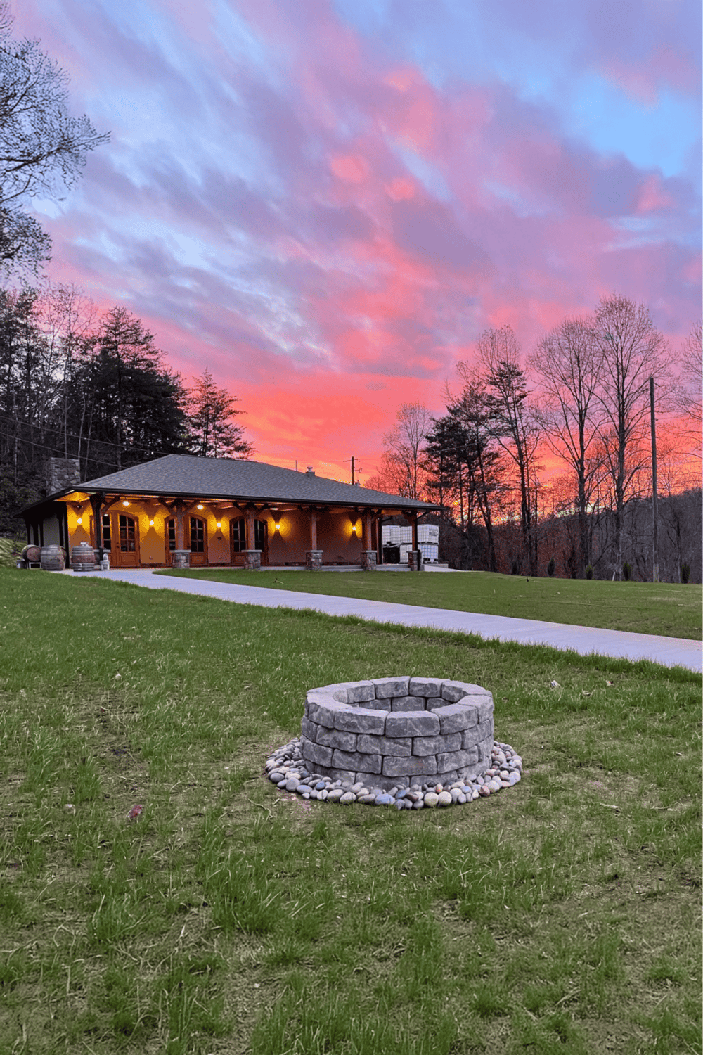 Fire pit outdoor gathering space, scenic sunset view, cozy backyard, QuestForDirections guide.