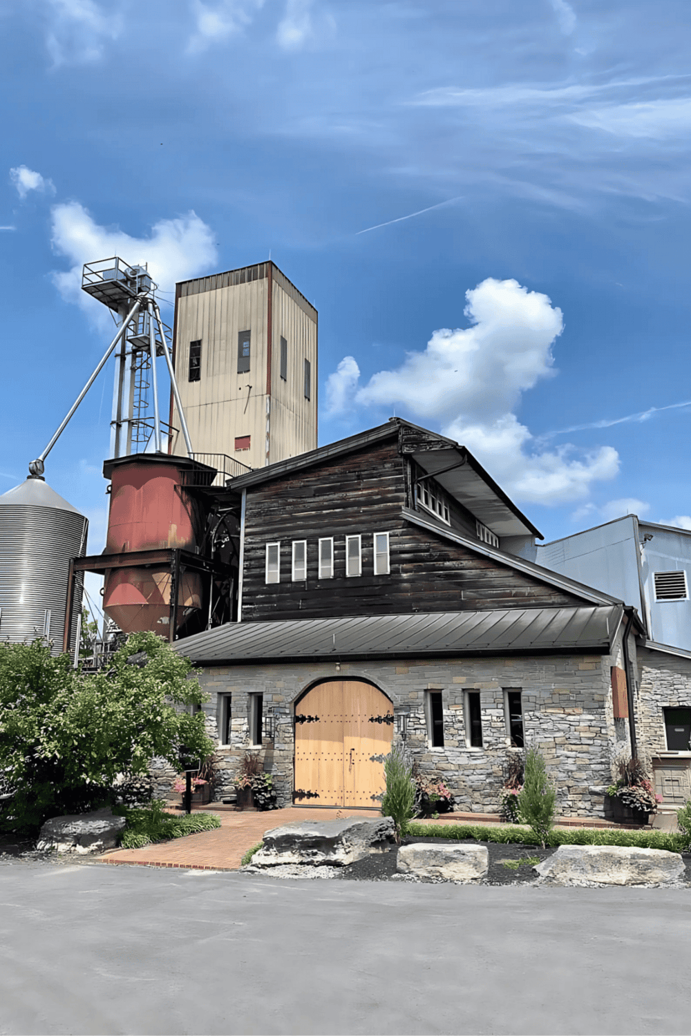 1. Vintage barn and silo, rustic farm architecture, blue sky, rural scenery.
