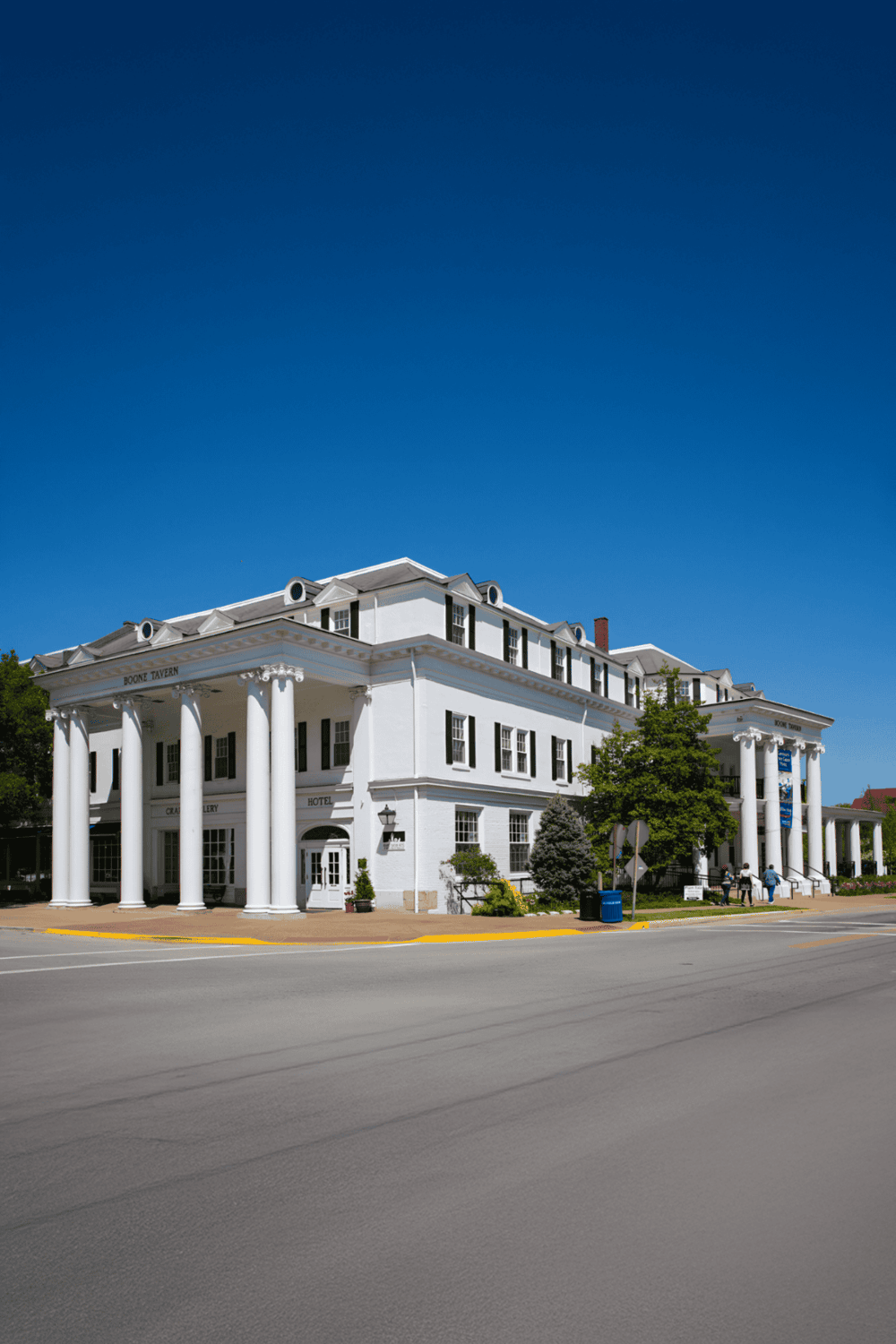 Historic white courthouse building with columns in QuestForDirections location, perfect for local guides.