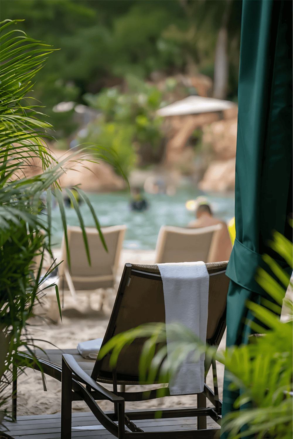 1. Poolside lounge chair with towel at tropical resort, relaxing beach getaway in Nature.