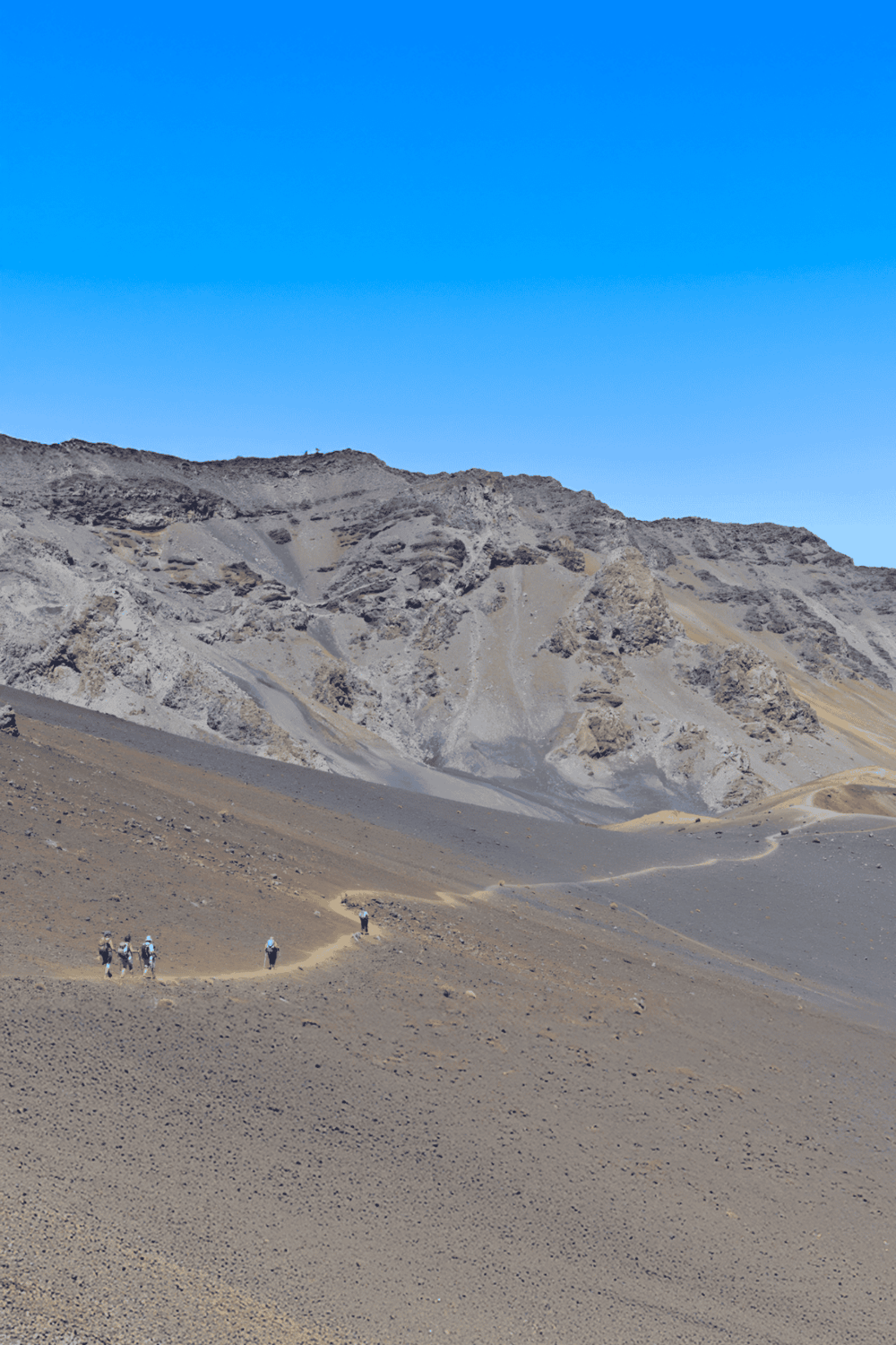 Trail hiking in a desert mountain landscape for adventure and outdoor exploration.