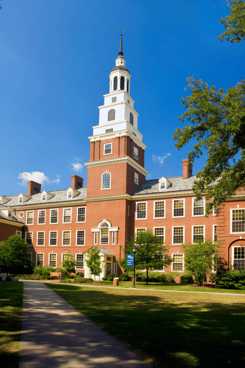 Historic courthouse with clock tower at QuestForDirections campus in Virginia.