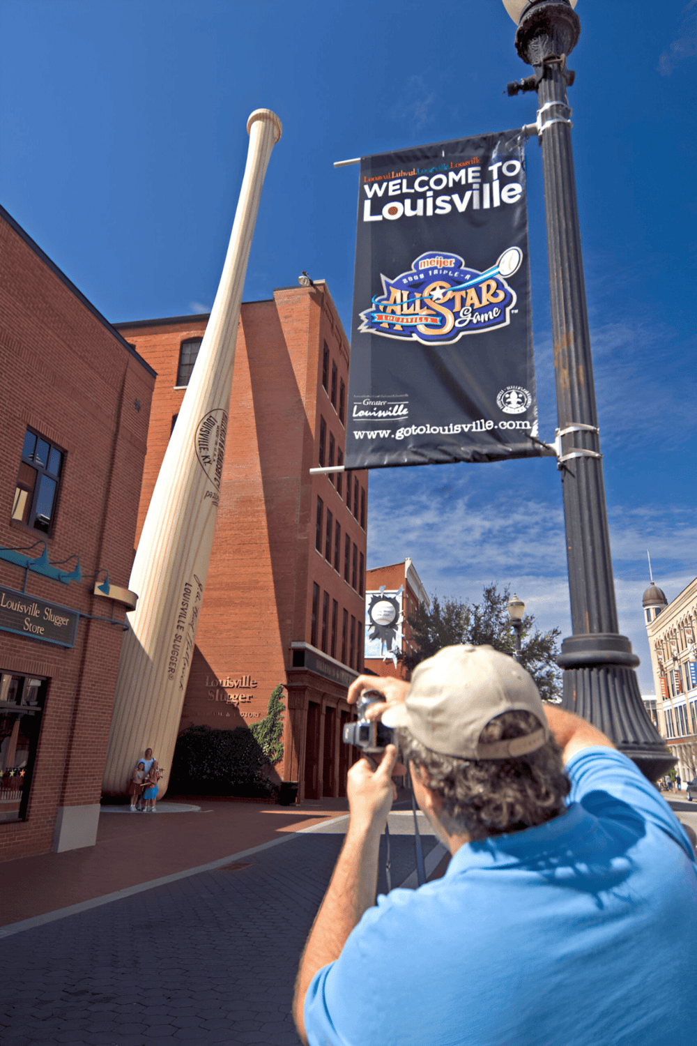 Historic downtown Louisville with a welcoming sign for the All-Star Game.