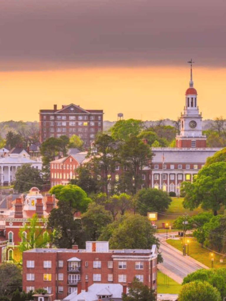 Vibrant dusk cityscape with historic buildings and lush trees in QuestForDirections.