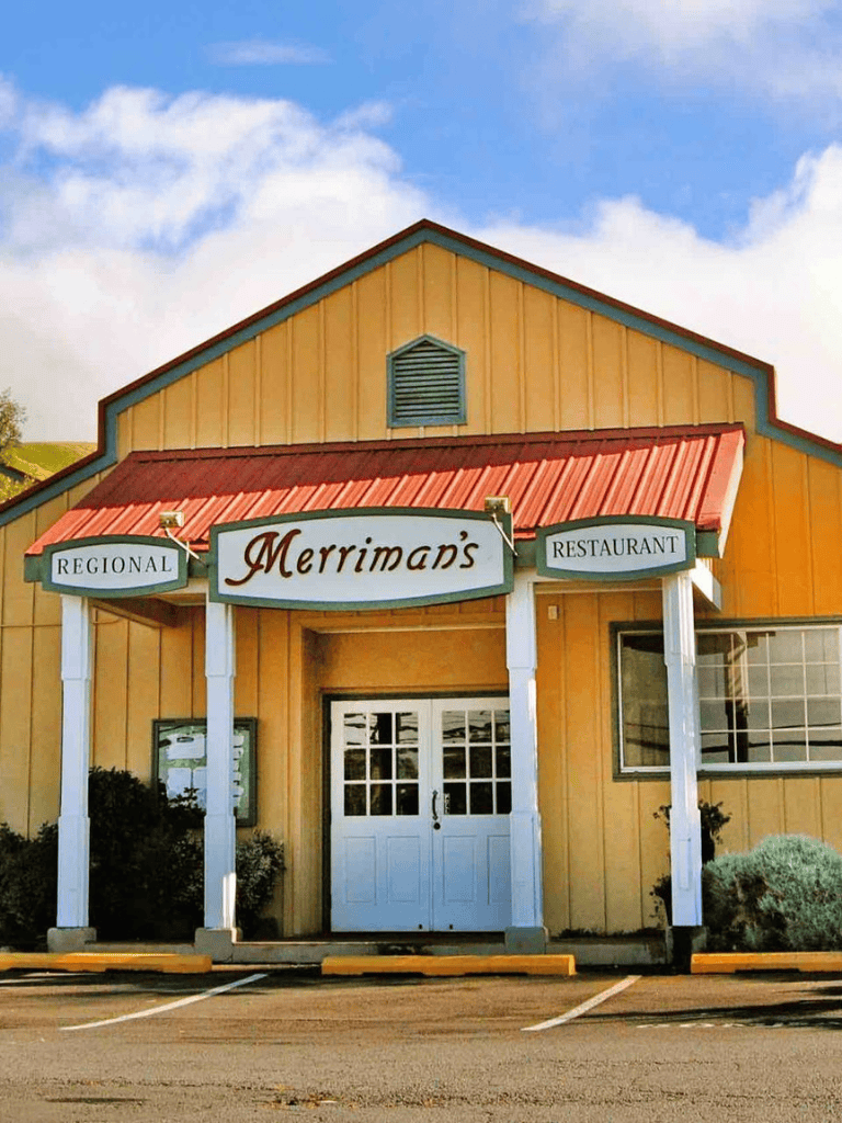 Cozy regional restaurant Merriman's with inviting entrance and outdoor parking.