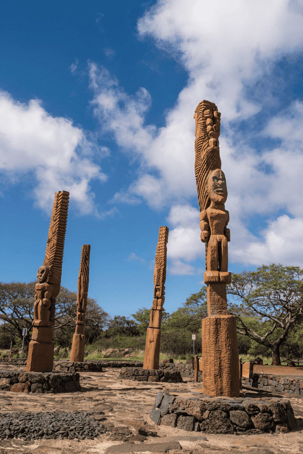Ancient Tiki statues in Hawaii representing Polynesian culture and history.