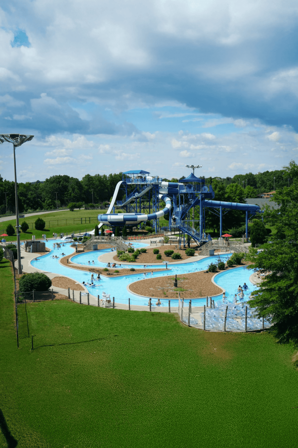 Water park with water slides, lazy river, and family-friendly attractions for summer fun.