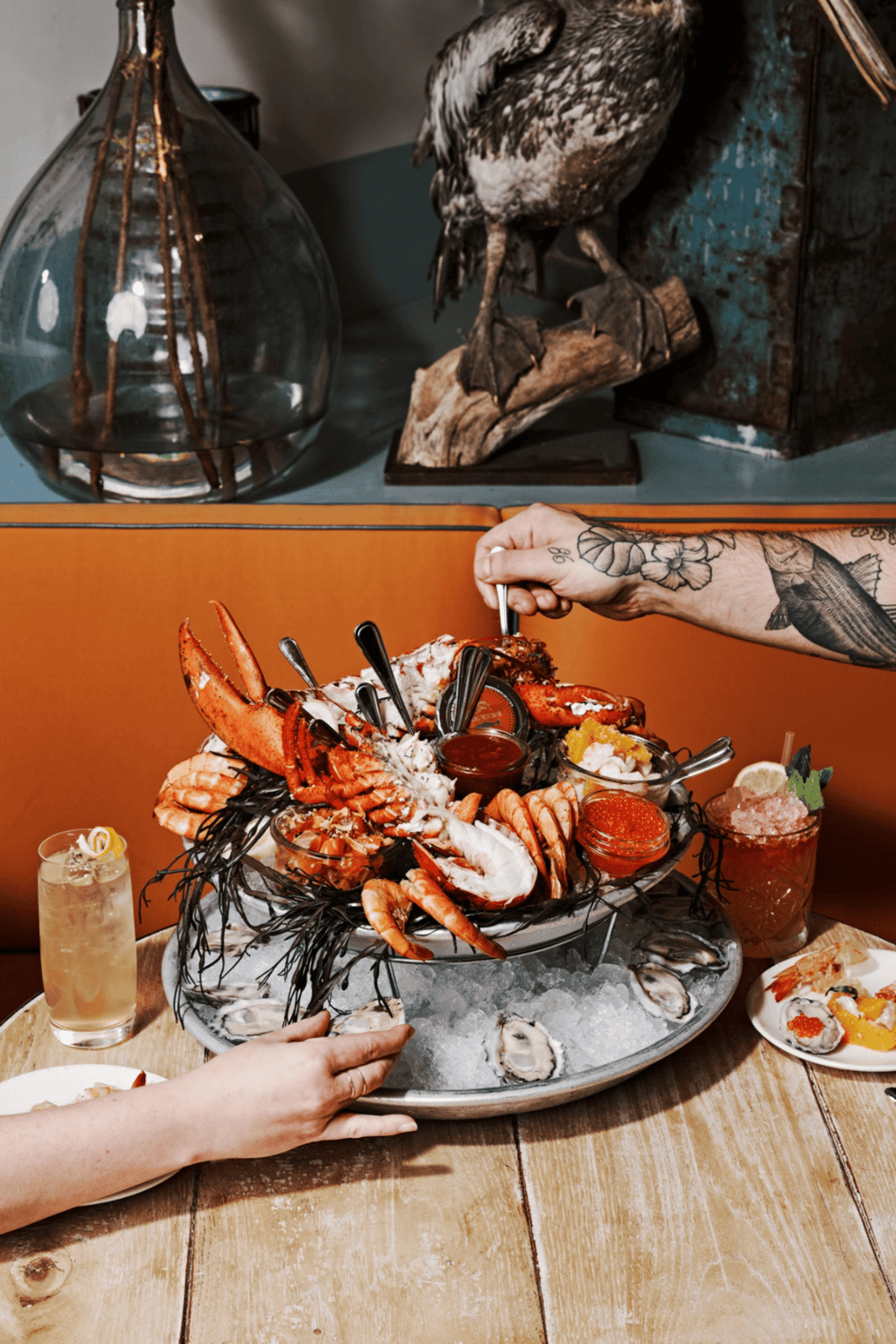 Fresh seafood platter with lobster, crab, oysters, and shrimp at QuestForDirections restaurant.