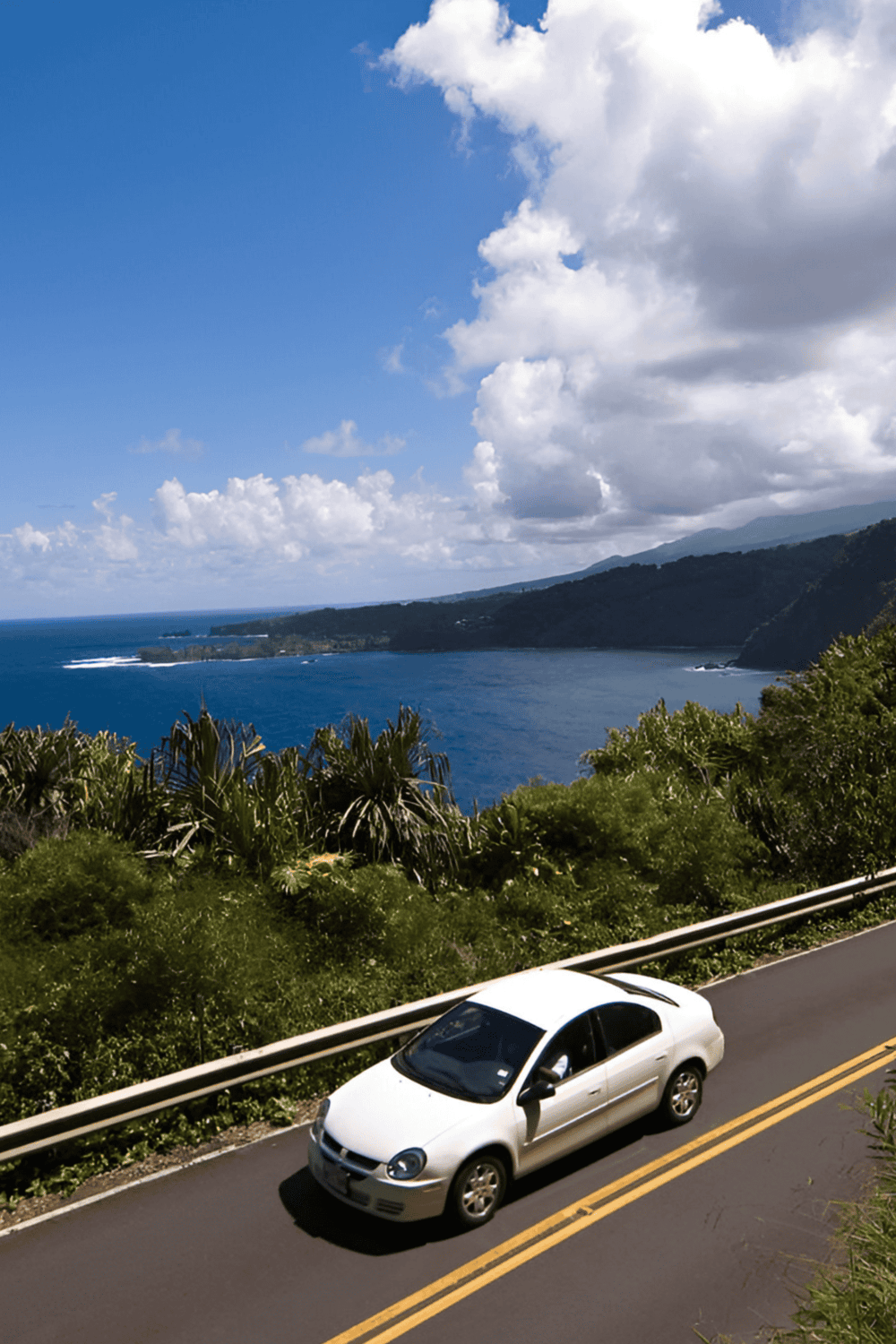 Beautiful coastal drive with ocean views and lush greenery, perfect for travel planning and scenic adventures.