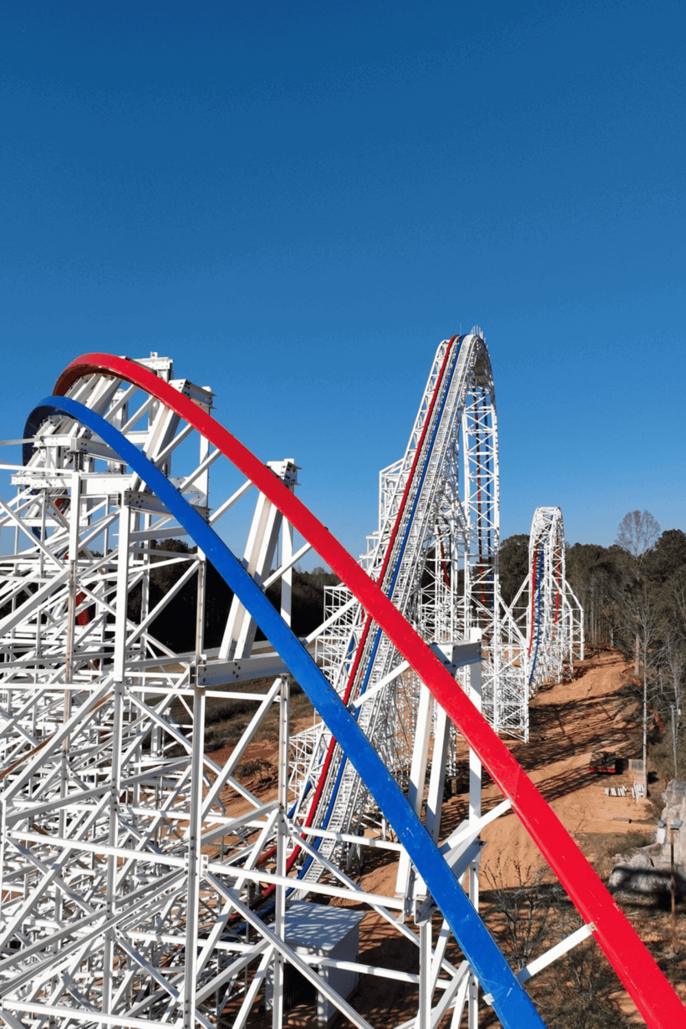 1. Brightly colored roller coaster at QuestForDirections amusement park.