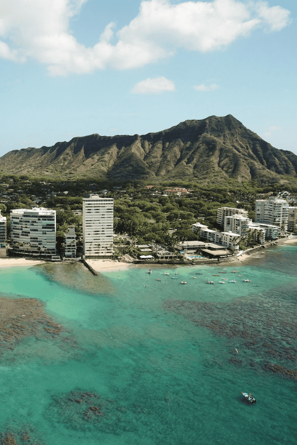 Oceanfront luxury resort with Diamond Head views, Hawaii vacation destination.