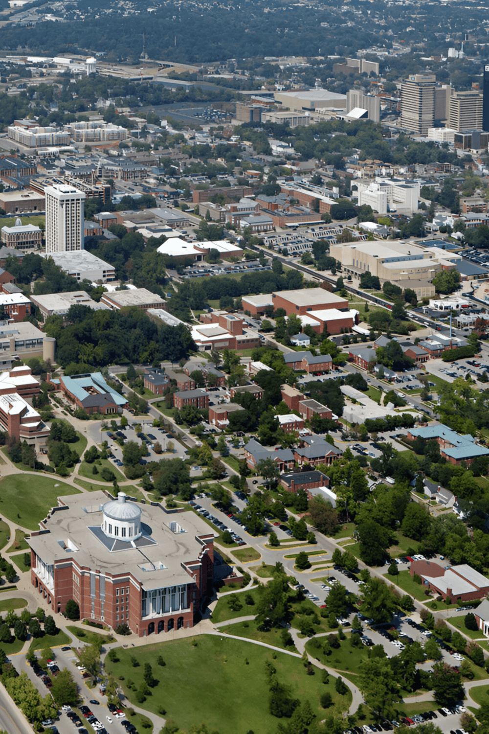 Aerial view of business district and university campus, highlighting QuestForDirections' campus navigation solutions.